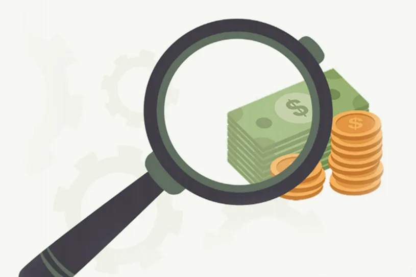 Image of a magnifying glass and money, including...