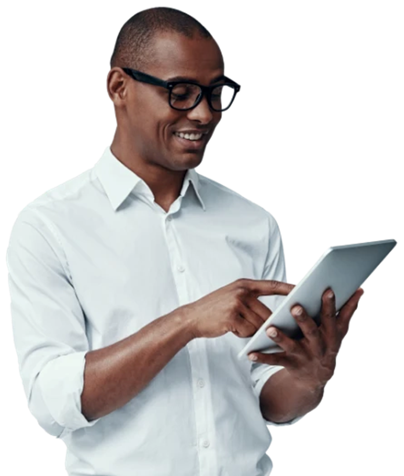 Man wearing glasses smiling and holding a tablet