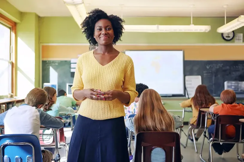 Happy, proud and young female educator with...