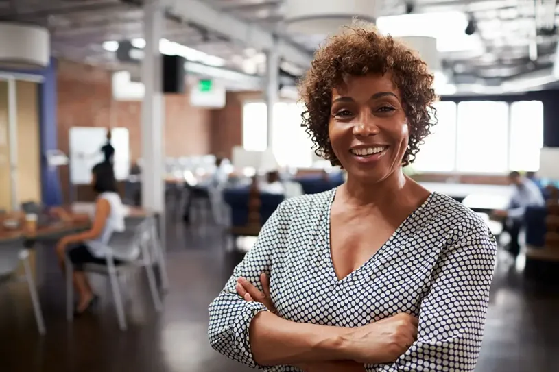 Portrait Of a smiling principal in a break room