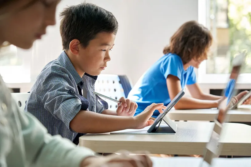 Students in classroom on tablets