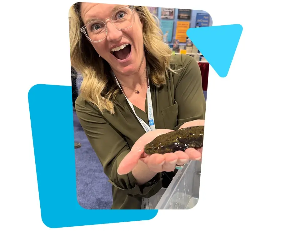 Photo of Lauren holding an axolotl