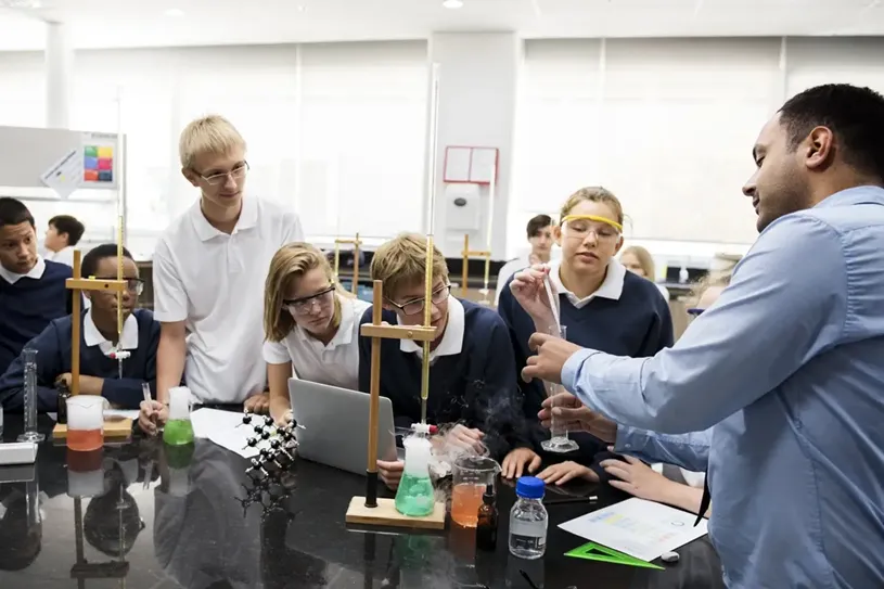 Students studying in chemistry laboratory...