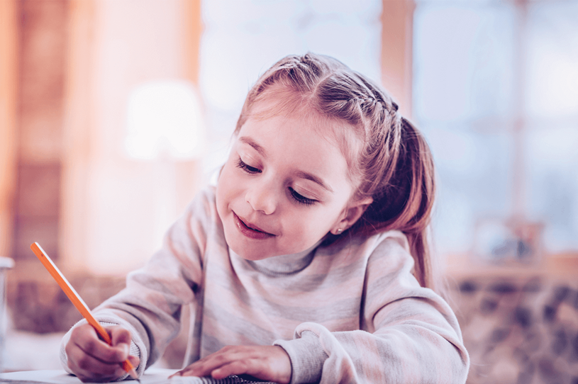 Young female student writing
