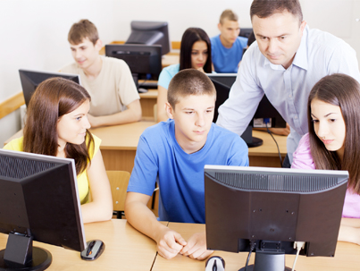 Students using computers in class