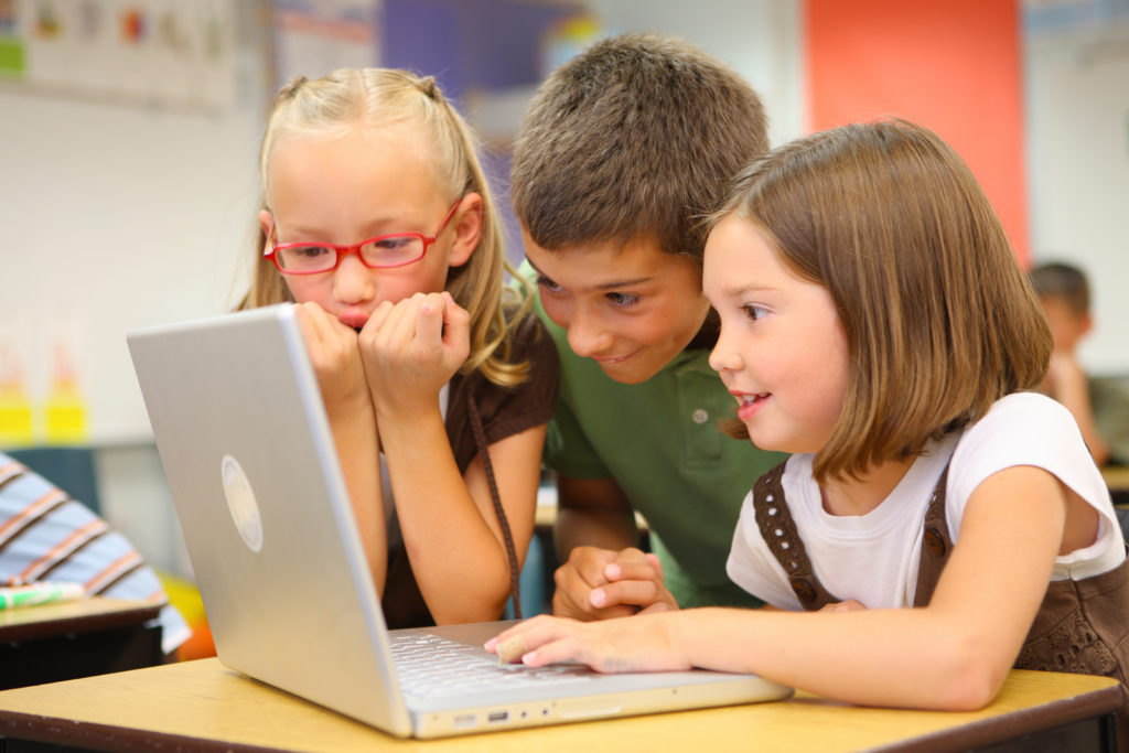 Students working on laptop